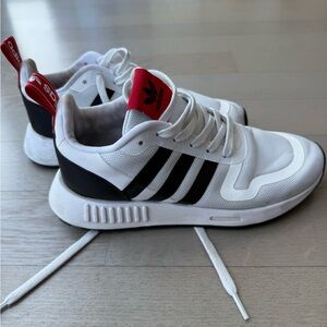Adidas White Sneakers with Black Stripes and Red Details
